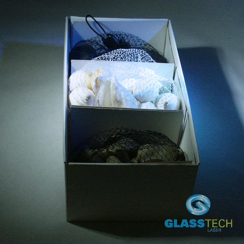 Kamínky a mušličky v krabičce